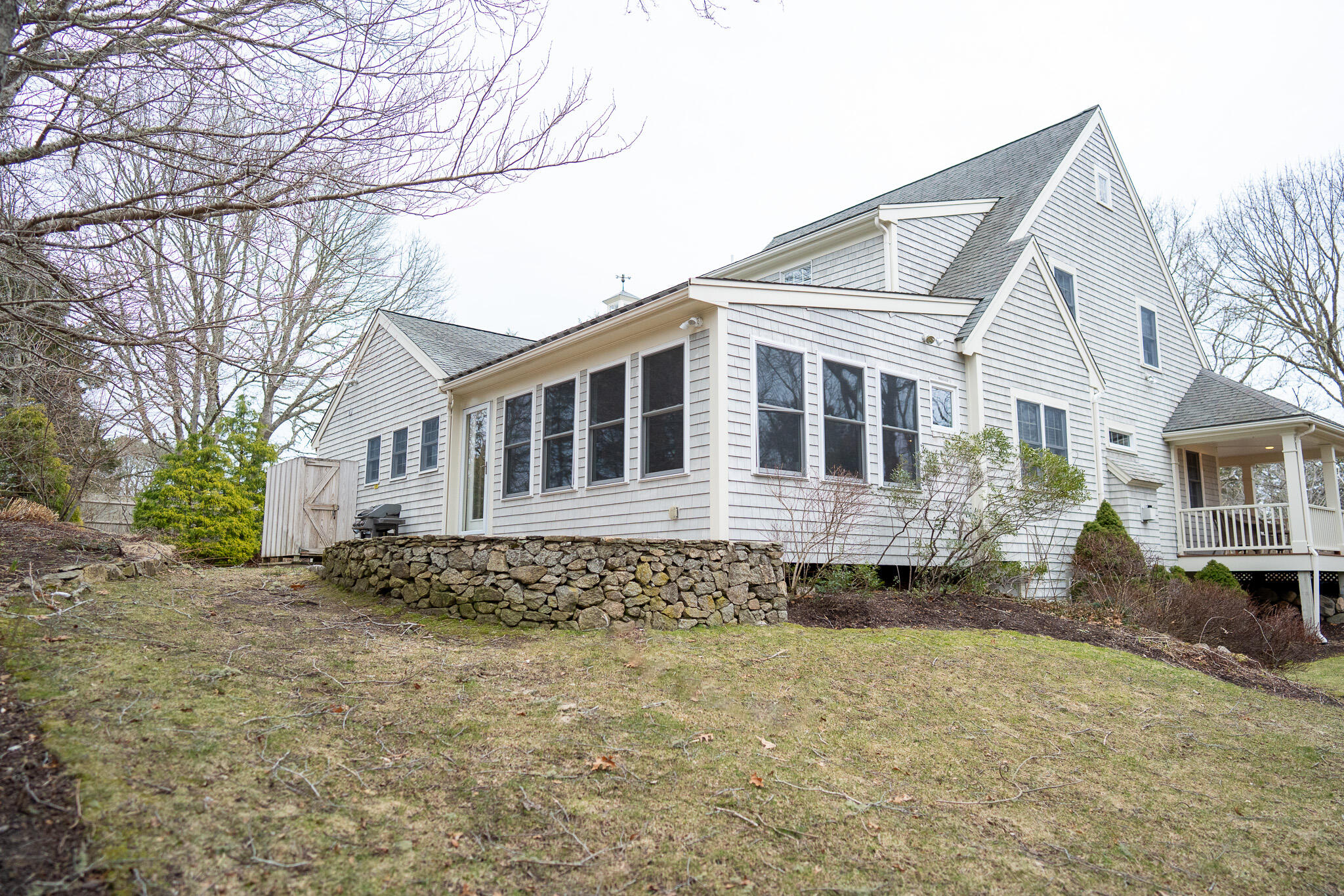 10 Abbey Gate Road Cotuit, MA 02635 - Photo 64 of 67 a house view with a outdoor space