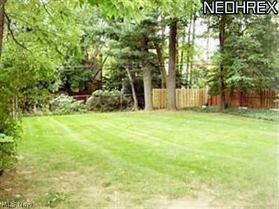 1945 Temblethurst Road South Euclid, OH 44121 - Photo 15 of 15 Patio Overlooks Lush Park-like, Partially Fenced Large Backyard