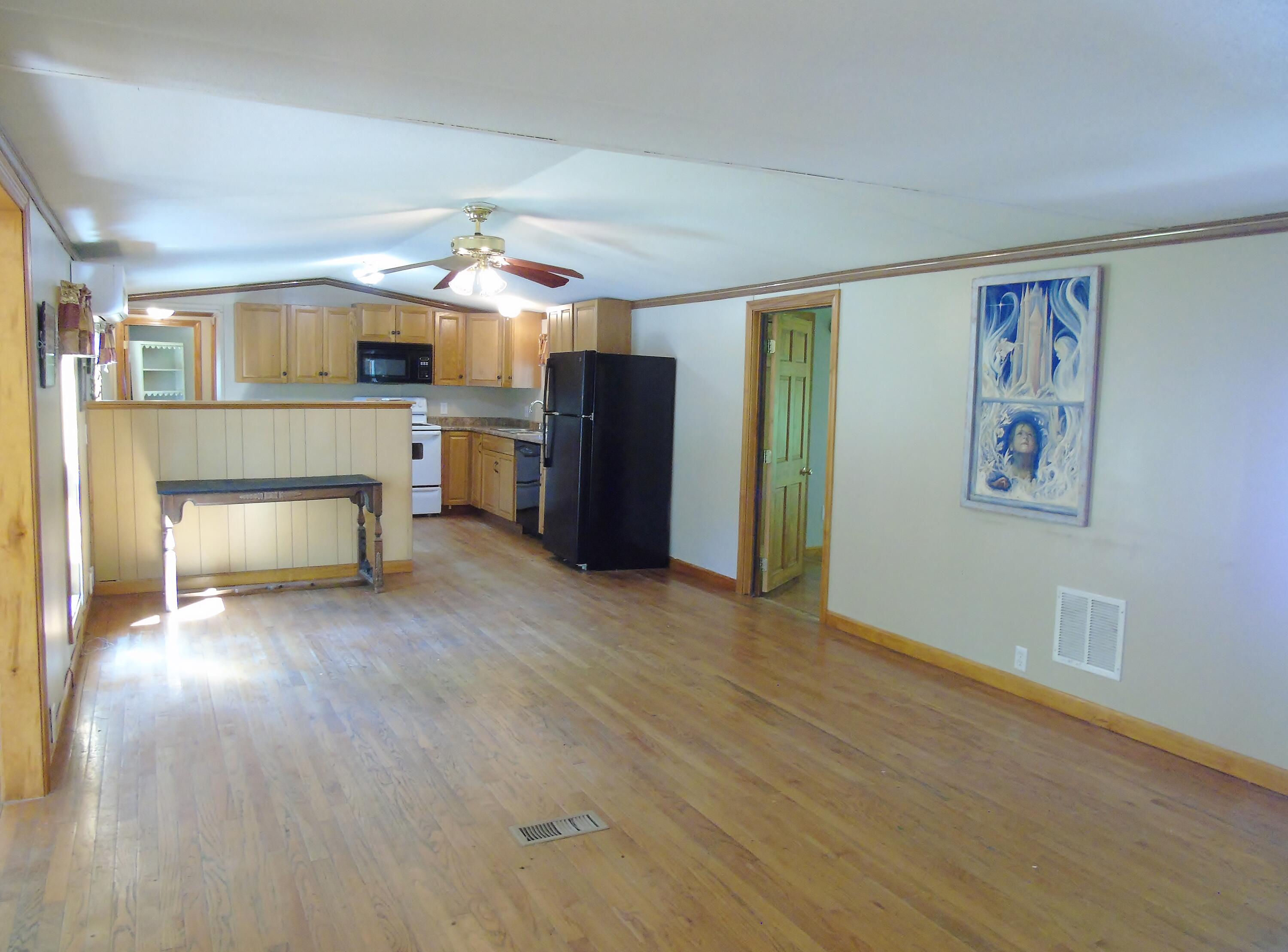 181 Ellingwood Road Paris, ME 04281 - Photo 12 of 42 Living to den