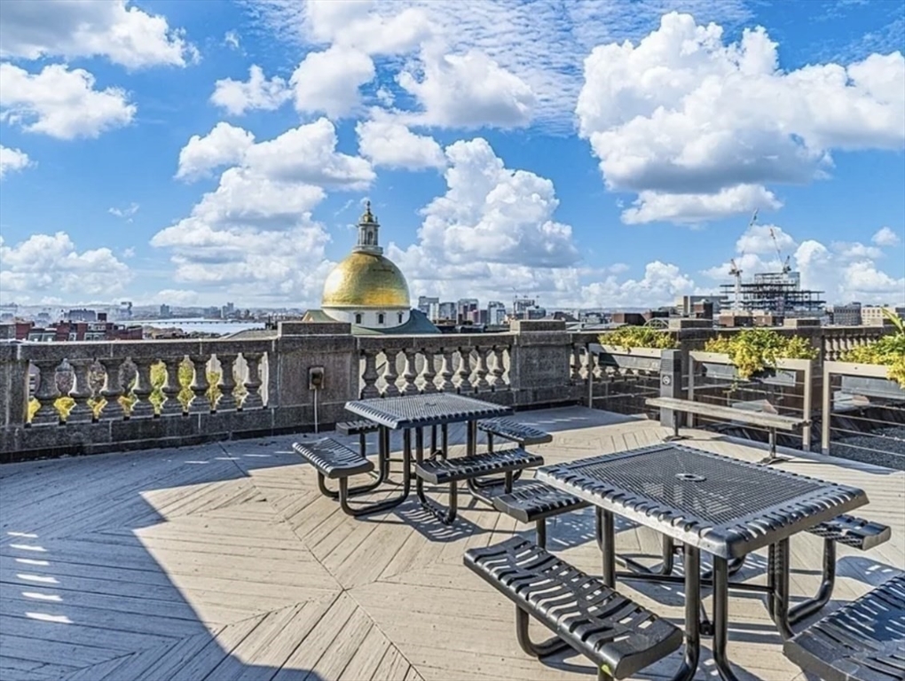 21 Beacon Street, Unit 11A Boston, MA 02108 - Photo 3 of 11 a view of a terrace with sitting area