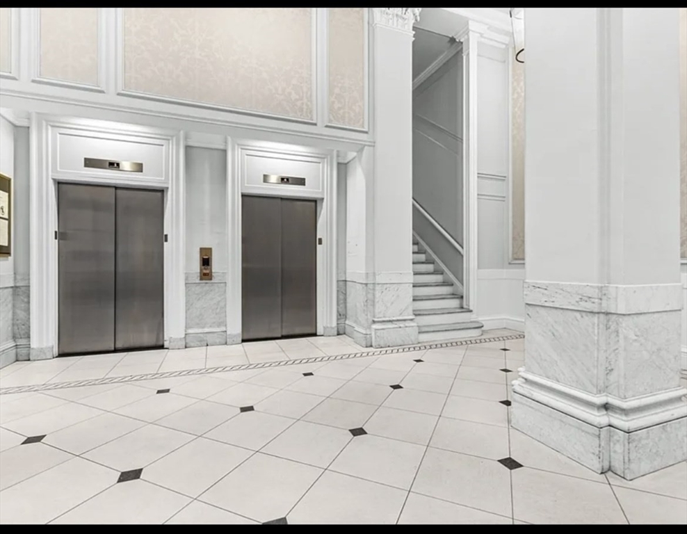 21 Beacon Street, Unit 11A Boston, MA 02108 - Photo 5 of 11 a view of entryway with bathroom