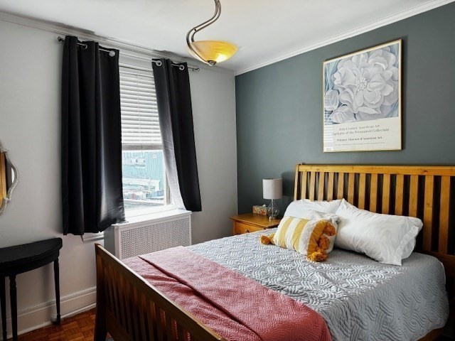 21 Beacon Street, Unit 11A Boston, MA 02108 - Photo 8 of 11 a bedroom with a bed and a window