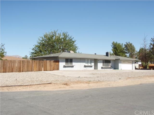 21845 Resoto Road Apple Valley, CA 92307 - Photo 1 of 1 front view of house with a yard