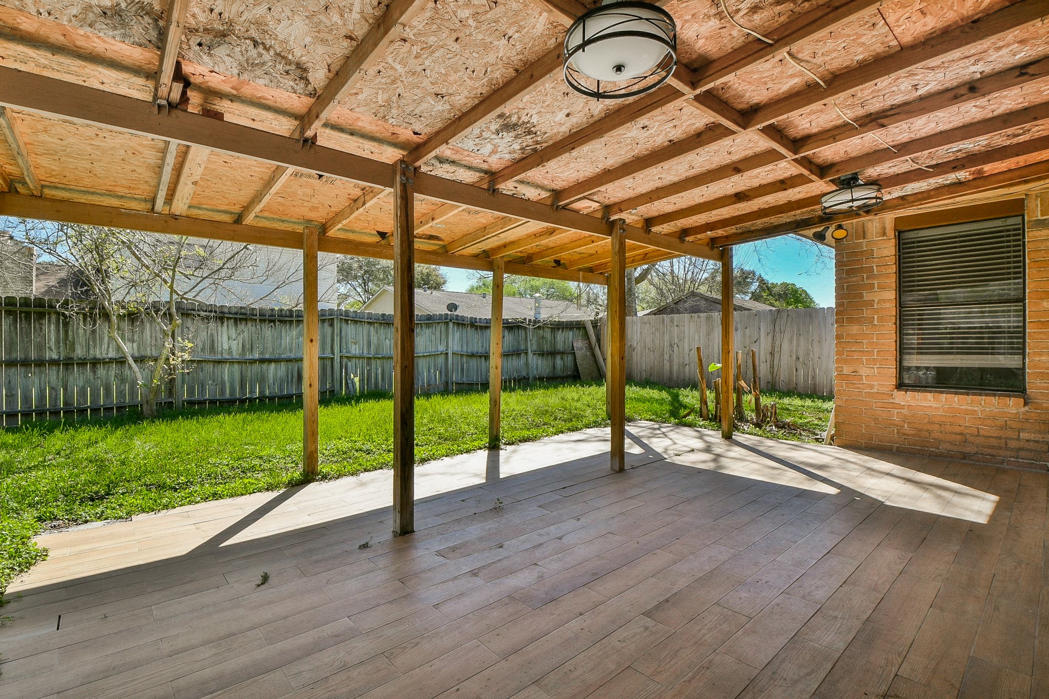 16711 Ribbonridge Drive Sugar Land, TX 77498 - Photo 21 of 24 a view of a backyard with porch