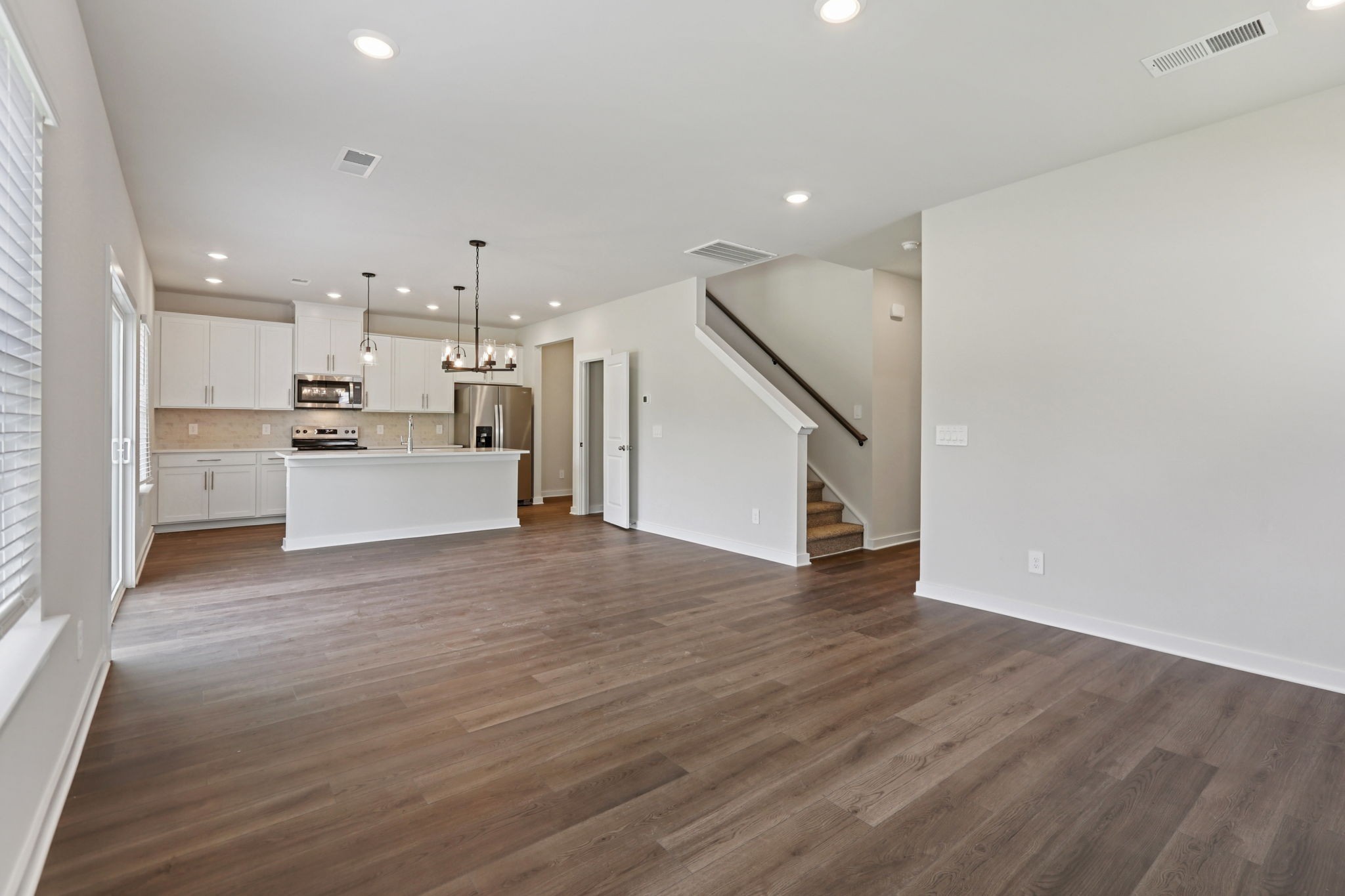 3823 Hallanday Drive Murfreesboro, TN 37128 - Photo 11 of 59 a view of a kitchen with wooden floor and electronic appliances