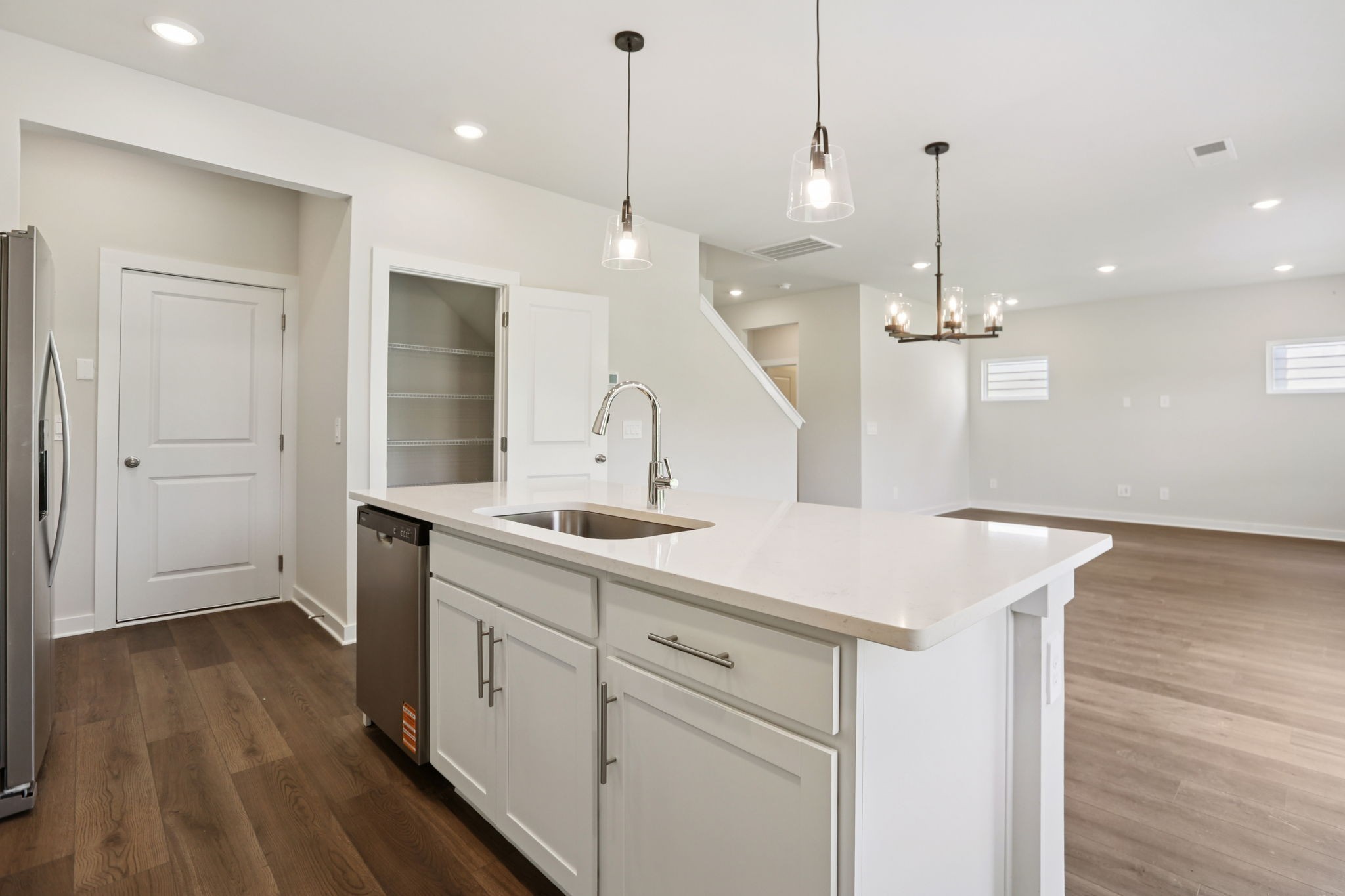 3823 Hallanday Drive Murfreesboro, TN 37128 - Photo 13 of 59 a kitchen with a sink a stove and a wooden floor