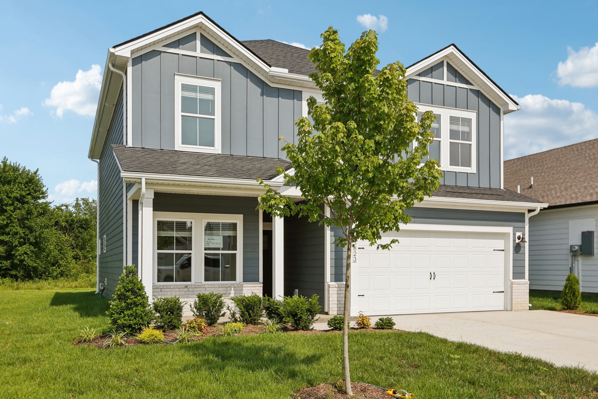 3823 Hallanday Drive Murfreesboro, TN 37128 - Photo 3 of 59 a front view of a house with garden
