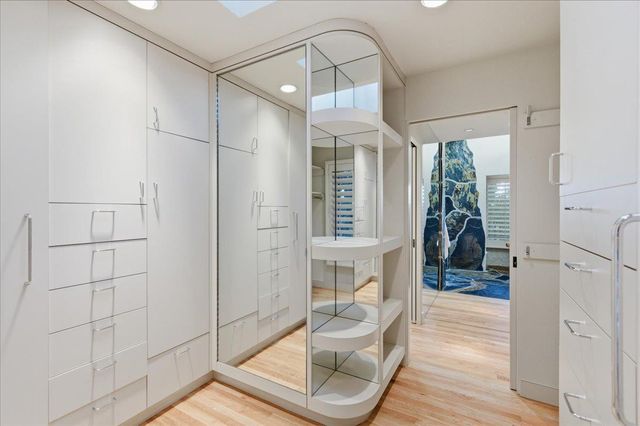 a view of living room kitchen and entryway