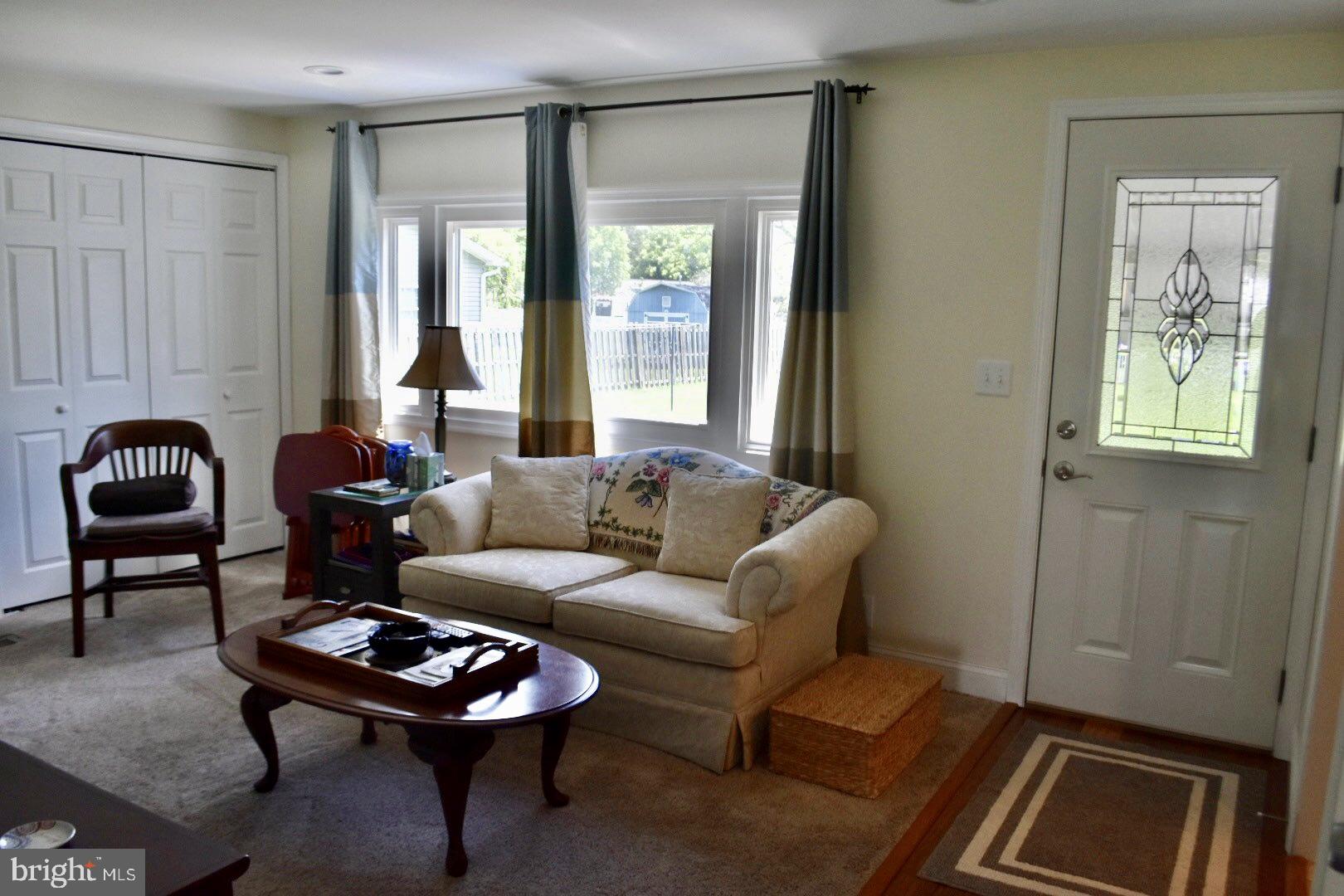 7309 Gunpowder Road Baltimore, MD 21220 - Photo 17 of 47 Family room enters to a screen porch.