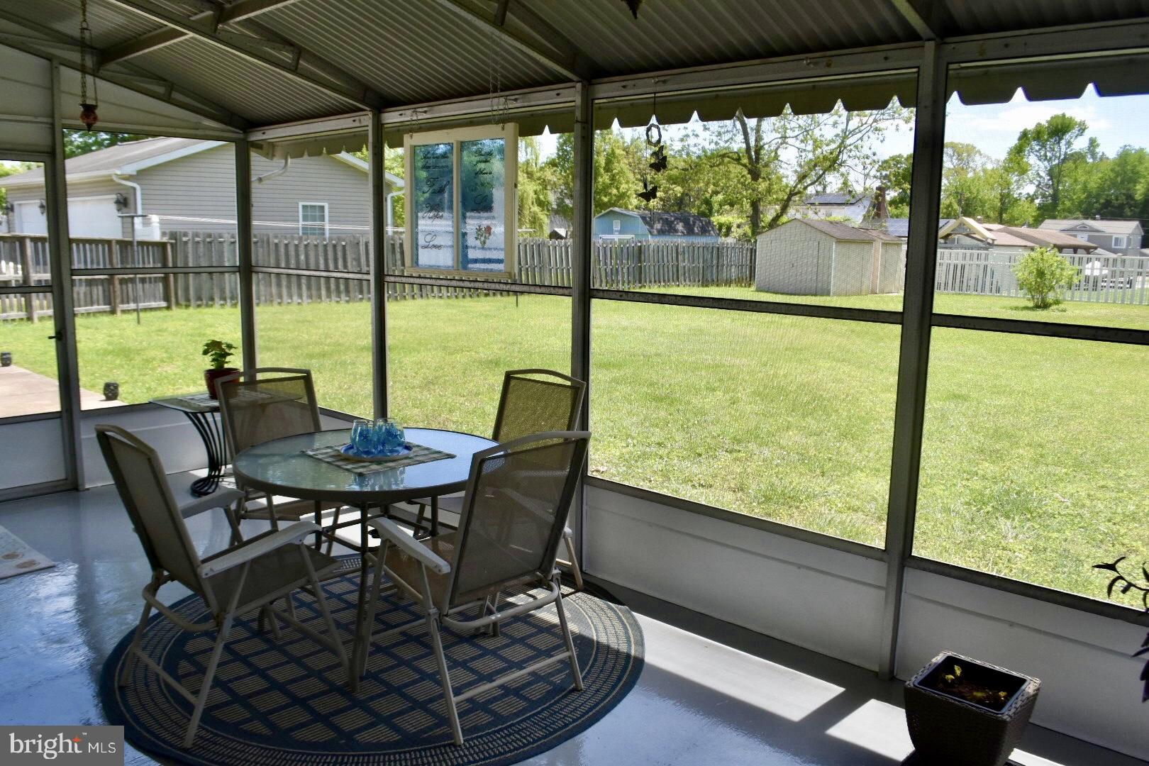 7309 Gunpowder Road Baltimore, MD 21220 - Photo 32 of 47 Screen in porch great for crab days.