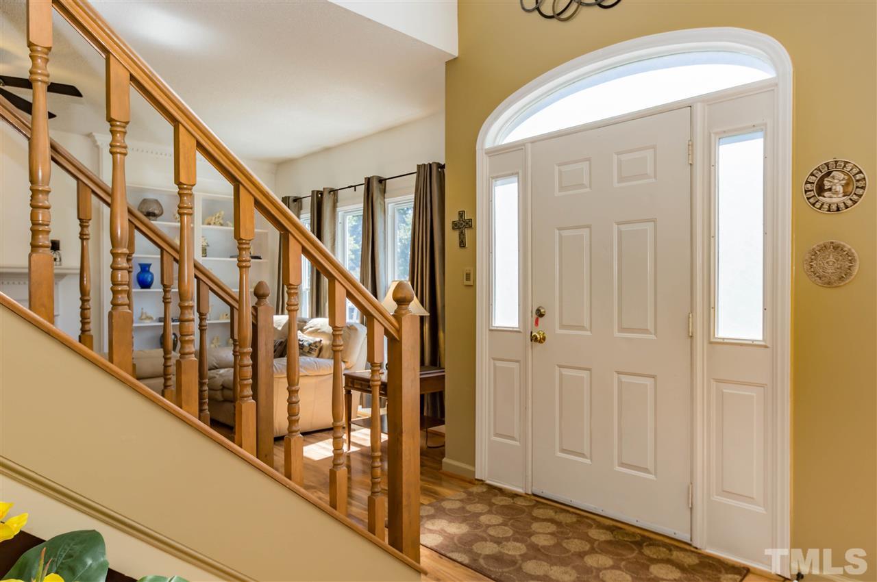 5232 Knightsbridge Way Raleigh, NC 27604 - Photo 3 of 25 a view of an entryway with wooden floor