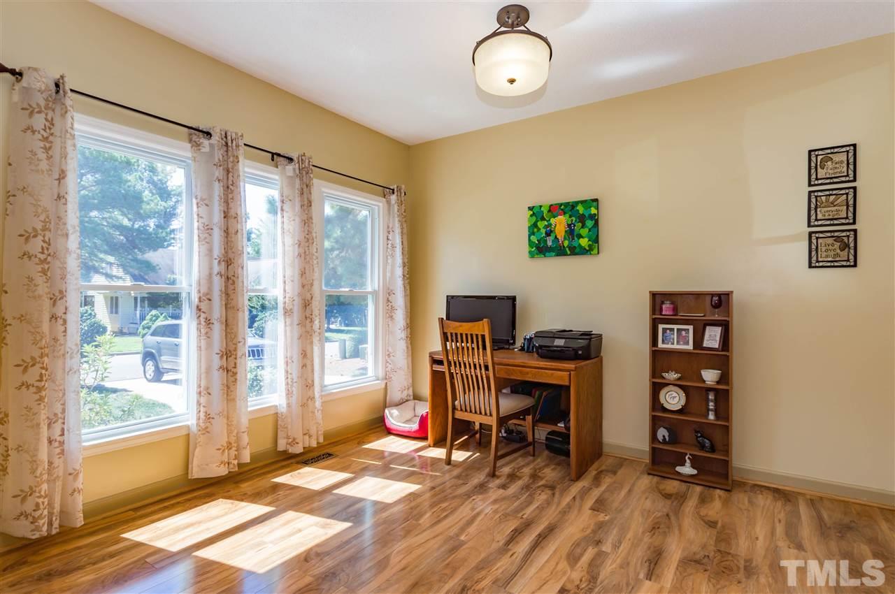 5232 Knightsbridge Way Raleigh, NC 27604 - Photo 4 of 25 a view of a livingroom with workspace and a window