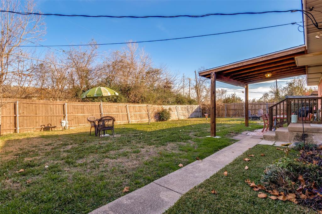 2602 Ridgecrest Drive Garland, TX 75041 - Photo 18 of 24 a view of a backyard