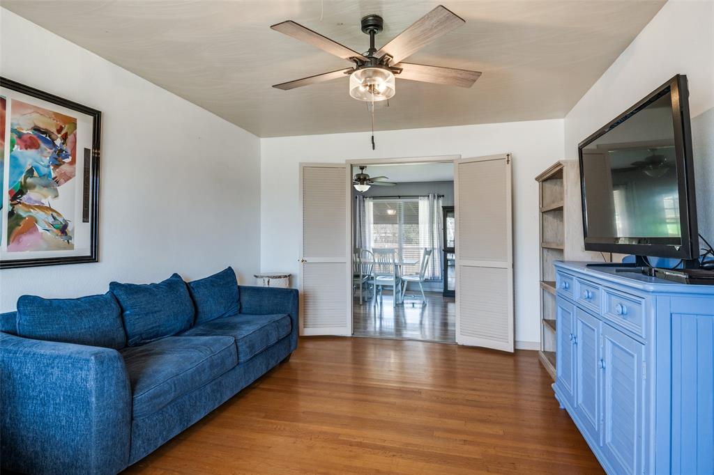 2602 Ridgecrest Drive Garland, TX 75041 - Photo 3 of 24 a living room with furniture and a wooden floor