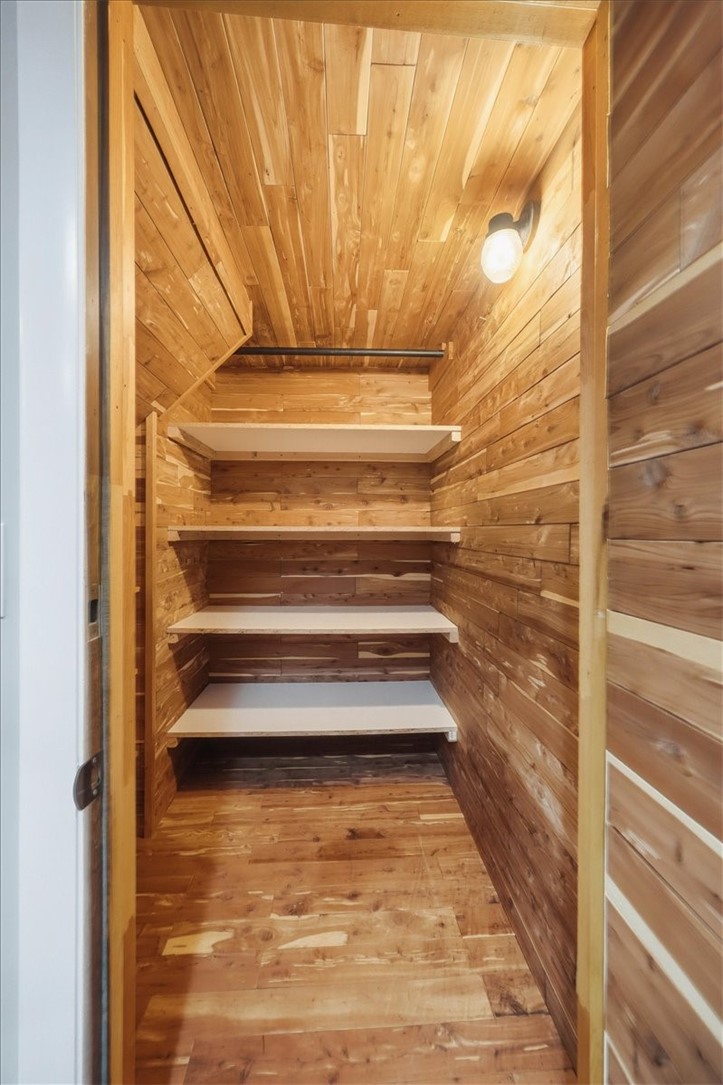 214 Anan Wade Road Glocester, RI 02857 - Photo 27 of 50 An unexpected bonus—this spacious cedar closet offers abundant shelving and dedicated storage for seasonal clothing, linens and more.