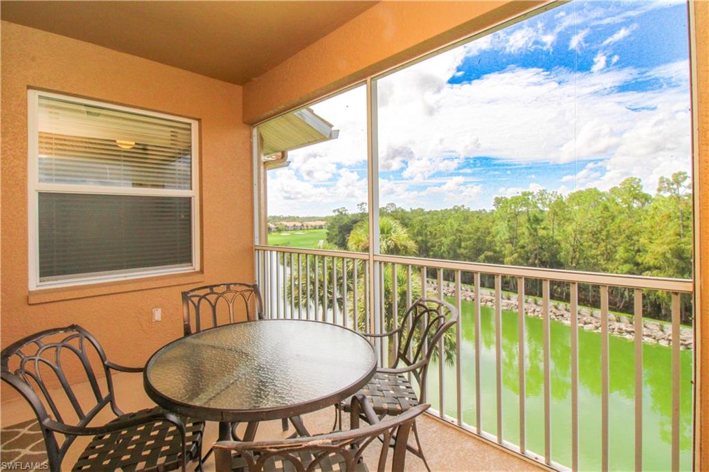 3820 Sawgrass Way, Unit 3046 Naples, FL 34112 - Photo 34 of 50 a view of a balcony and furniture