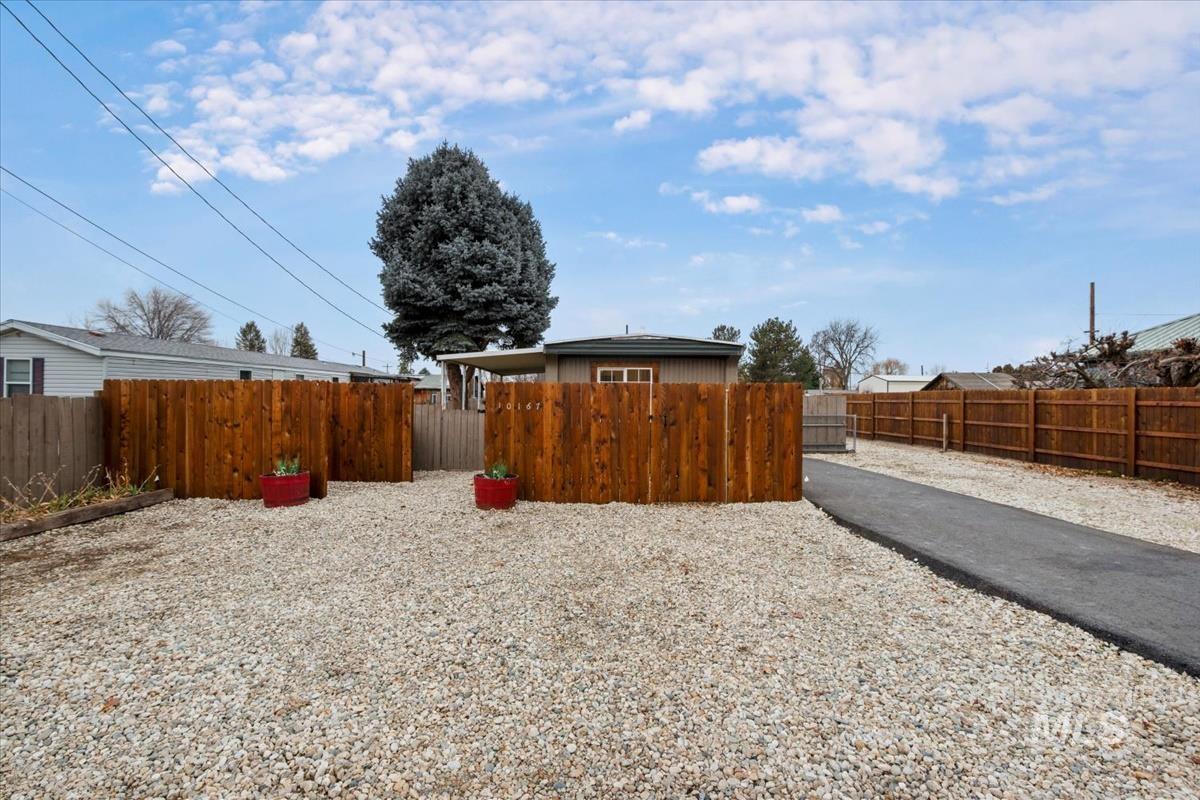 10167 Maymie Road Boise, ID 83714 - Photo 2 of 31 View of fenced backyard