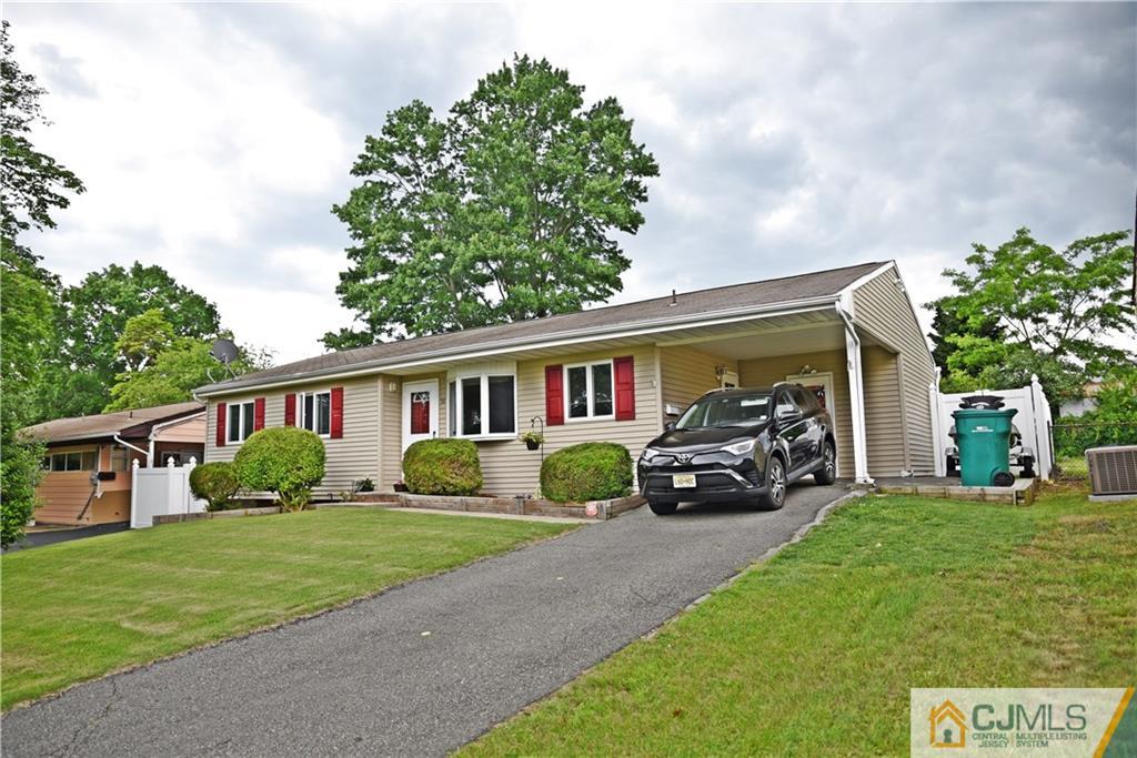 58 Princeton Road Old Bridge, NJ 08859 - Photo 1 of 24 a front view of a house with garden and porch