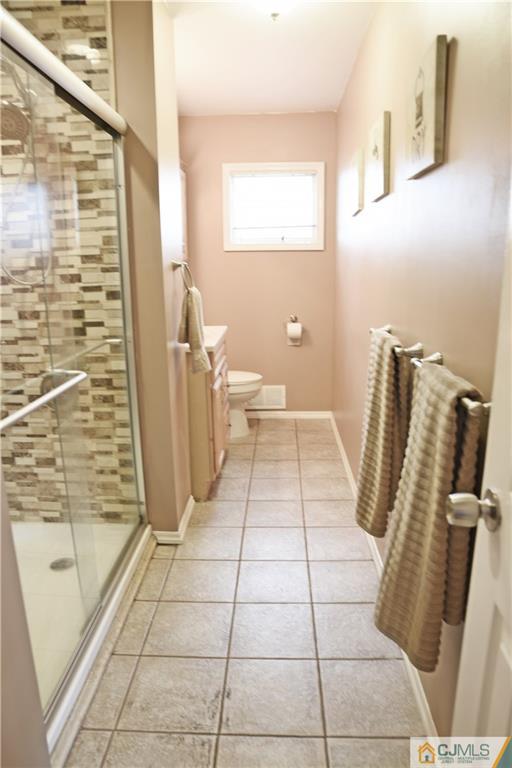 58 Princeton Road Old Bridge, NJ 08859 - Photo 13 of 24 a bathroom with a sink and a mirror