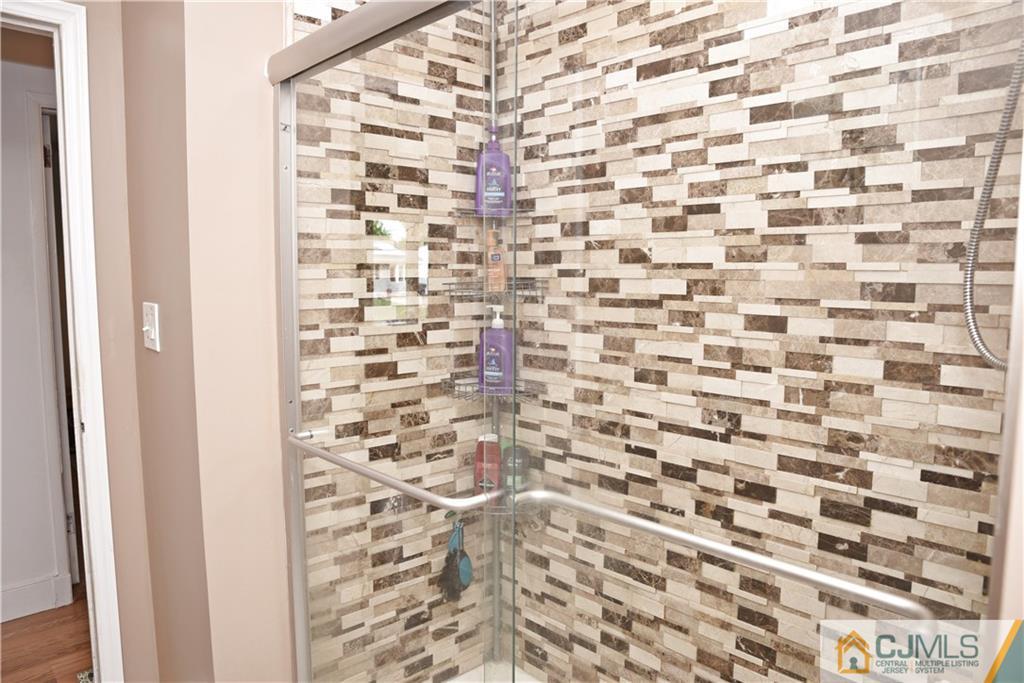 58 Princeton Road Old Bridge, NJ 08859 - Photo 15 of 24 a bathroom with a shower and a shower curtain