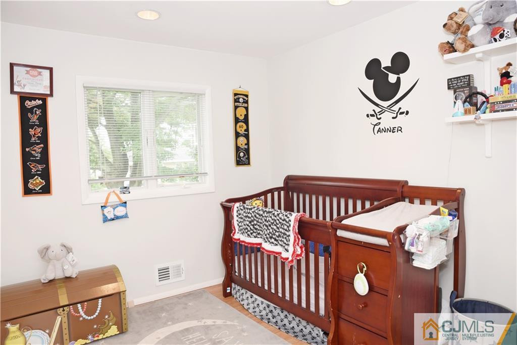 58 Princeton Road Old Bridge, NJ 08859 - Photo 17 of 24 a bedroom with a bed and window
