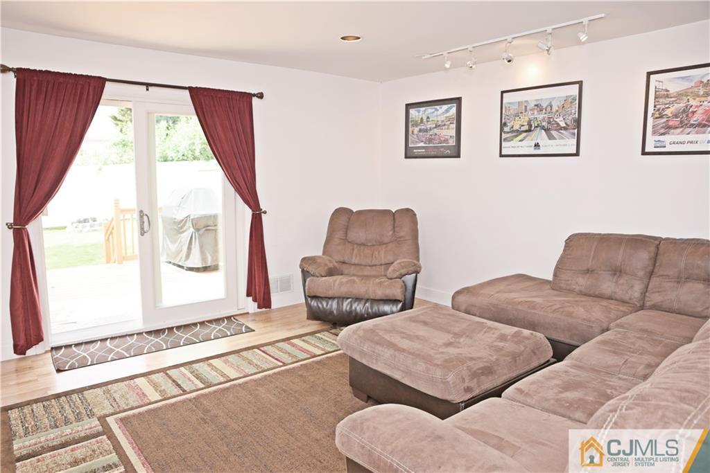 58 Princeton Road Old Bridge, NJ 08859 - Photo 5 of 24 a living room with furniture and a window