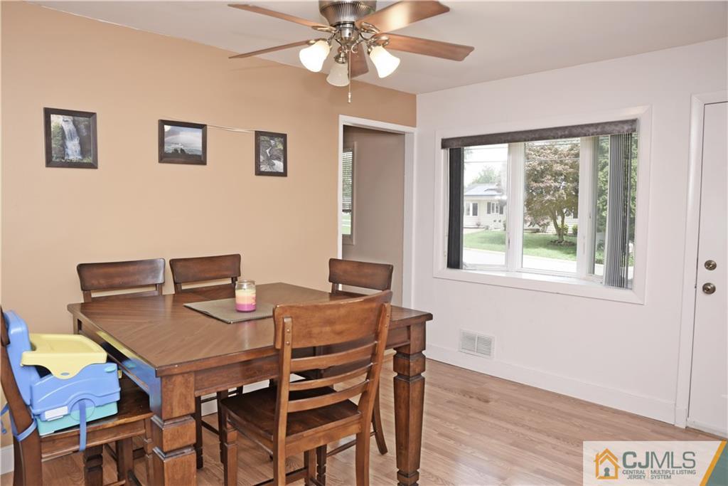 58 Princeton Road Old Bridge, NJ 08859 - Photo 6 of 24 a view of a dining room with furniture window and wooden floor