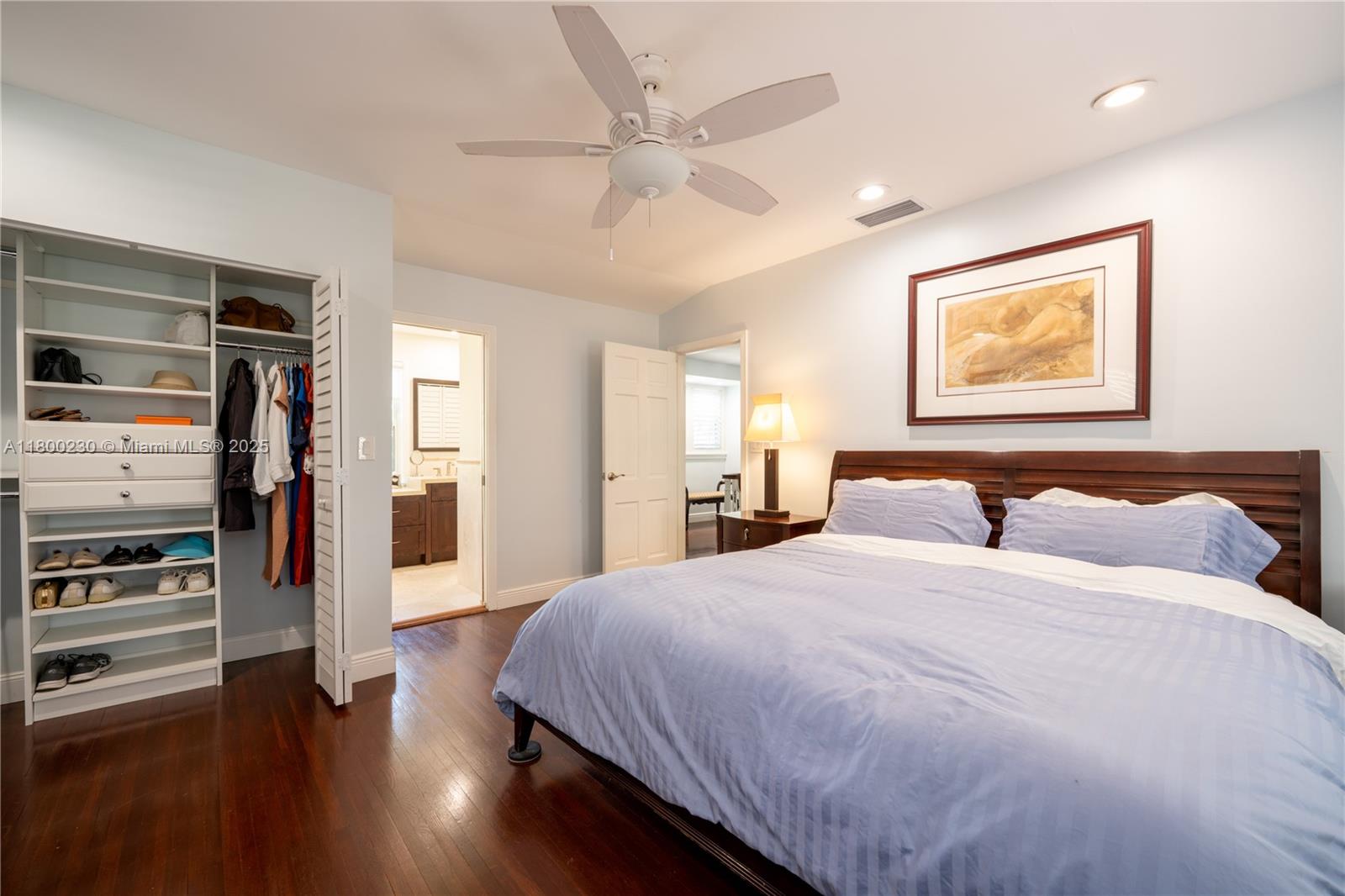 2855 Southwest 17th Avenue Miami, FL 33133 - Photo 14 of 84 a bedroom with a bed and a flat screen tv