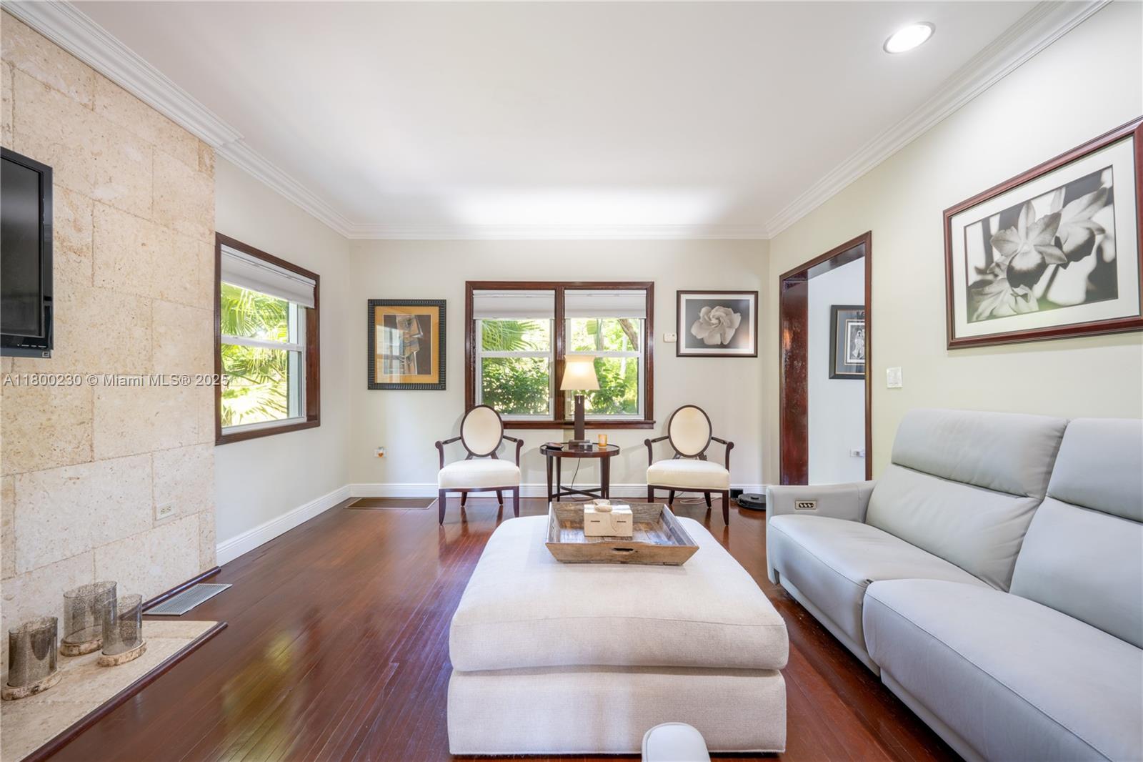 2855 Southwest 17th Avenue Miami, FL 33133 - Photo 2 of 84 a living room with furniture and wooden floor