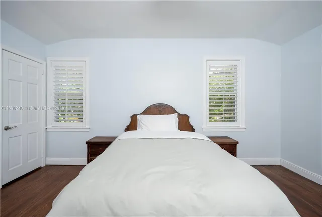 a bathroom with a toilet a sink and shower