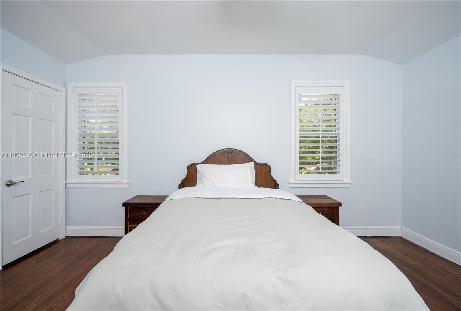 2855 Southwest 17th Avenue Miami, FL 33133 - Photo 22 of 84 a bedroom with a bed and a window