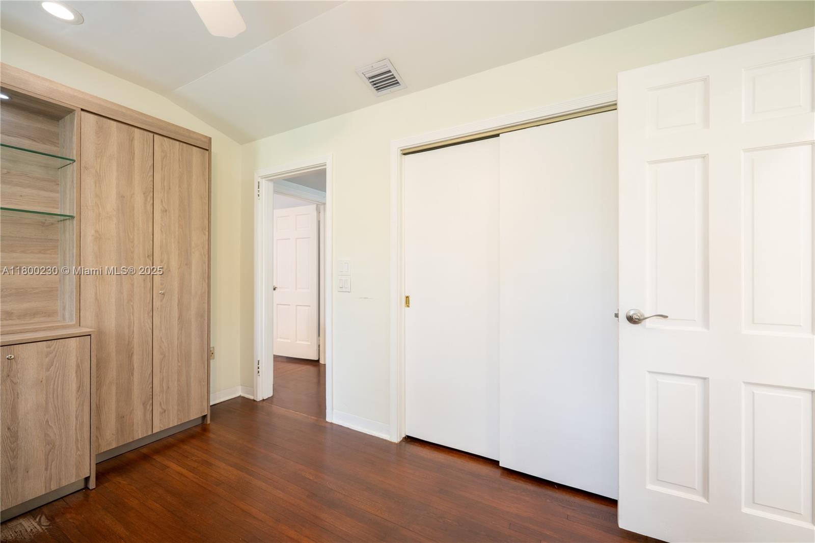 2855 Southwest 17th Avenue Miami, FL 33133 - Photo 24 of 84 a view of an empty room with wooden floor