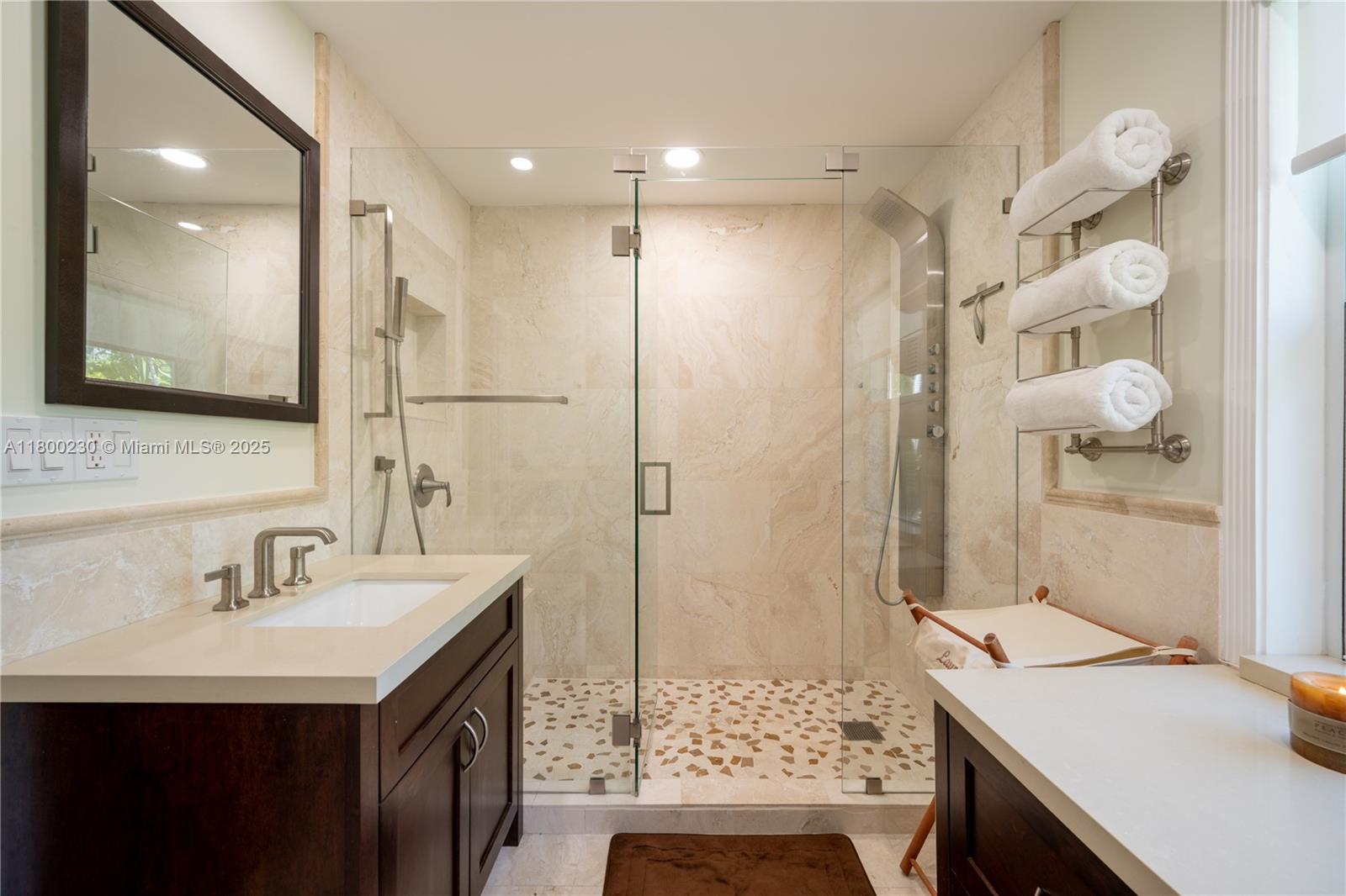 2855 Southwest 17th Avenue Miami, FL 33133 - Photo 25 of 84 a bathroom with a sink and a mirror