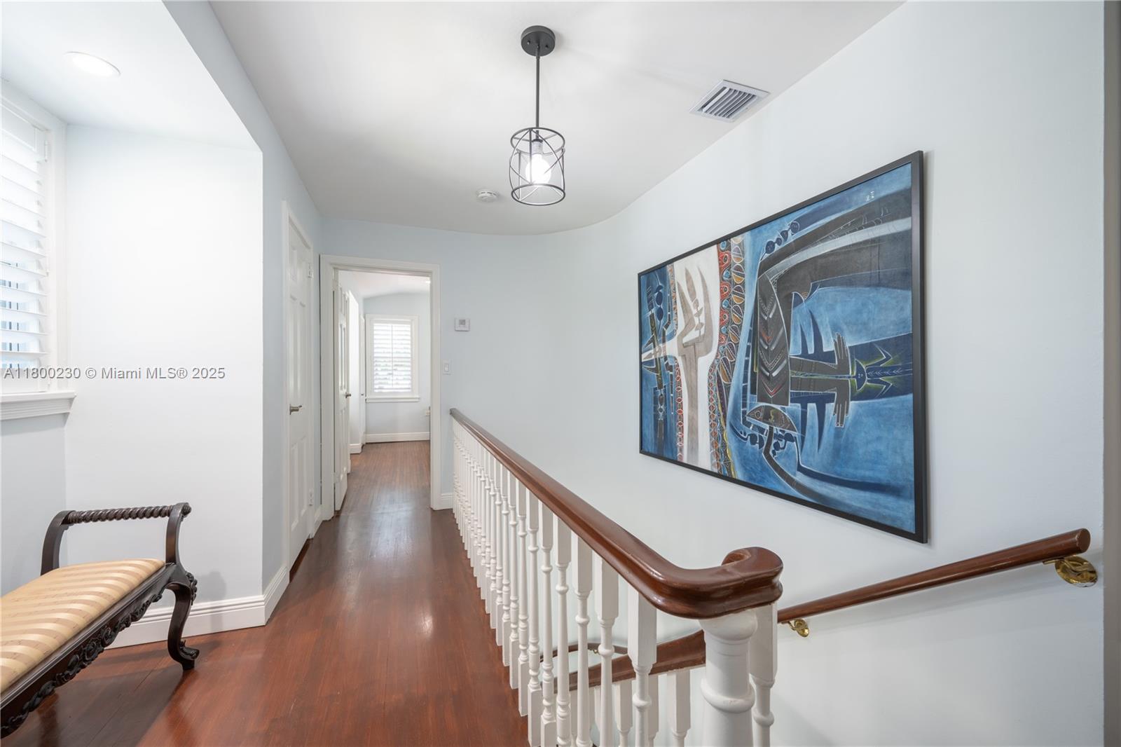 2855 Southwest 17th Avenue Miami, FL 33133 - Photo 28 of 84 a view of a hallway with wooden floor and stairs