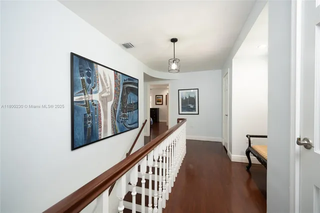 a kitchen with stainless steel appliances a stove sink and cabinets