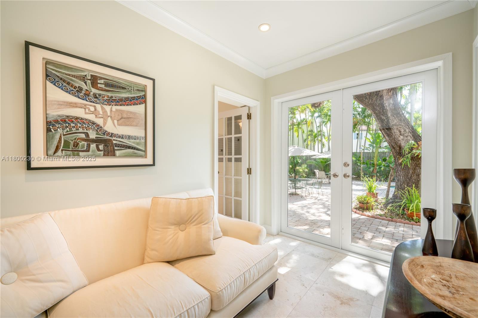 2855 Southwest 17th Avenue Miami, FL 33133 - Photo 46 of 84 a living room with furniture and a large window with outer view