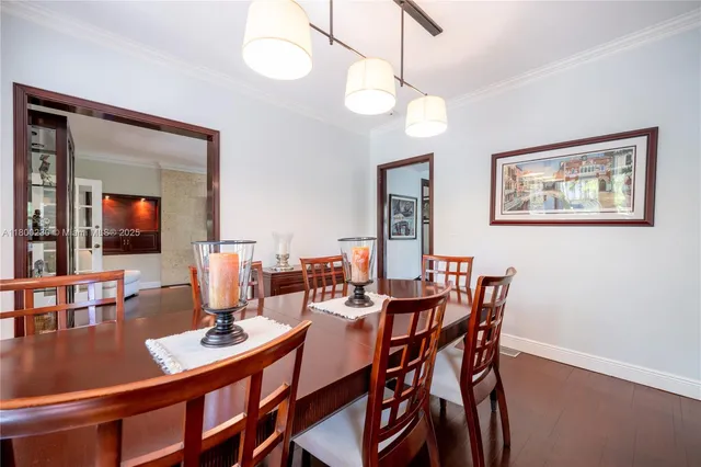 a view of a house with sitting area and garden