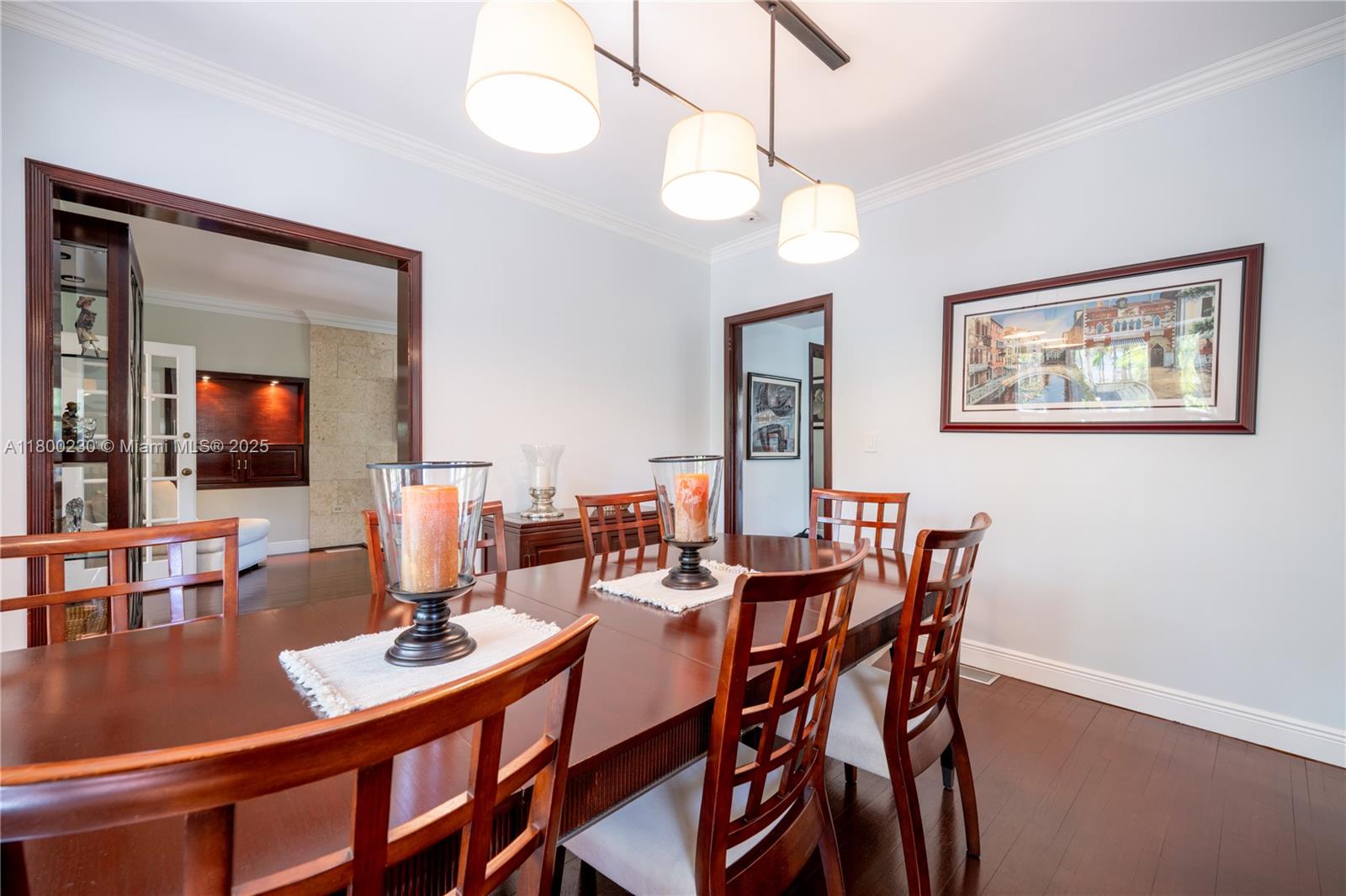 2855 Southwest 17th Avenue Miami, FL 33133 - Photo 47 of 84 a view of a dining room with furniture and a chandelier