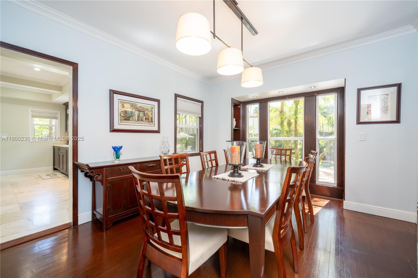 2855 Southwest 17th Avenue Miami, FL 33133 - Photo 5 of 84 a view of a dining room with furniture window and wooden floor