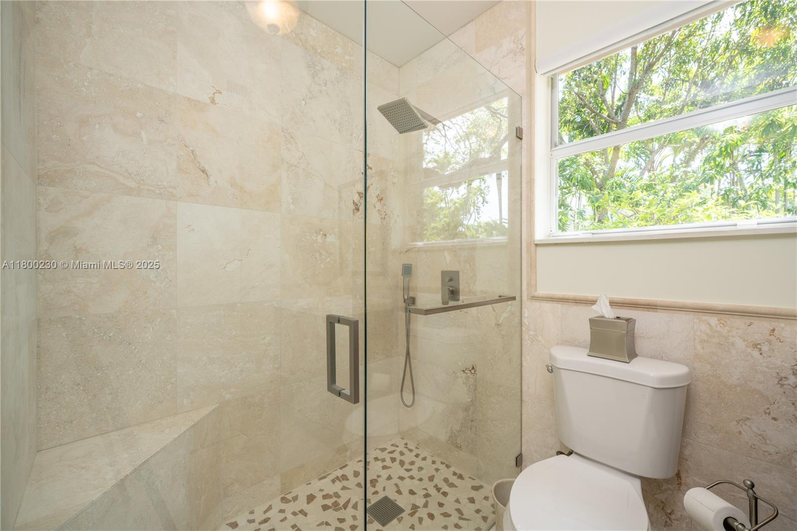 2855 Southwest 17th Avenue Miami, FL 33133 - Photo 60 of 84 a white toilet sitting next to a bathroom sink