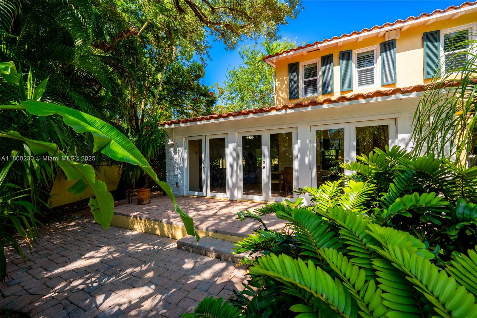 2855 Southwest 17th Avenue Miami, FL 33133 - Photo 64 of 84 a view of a house with sitting area and garden