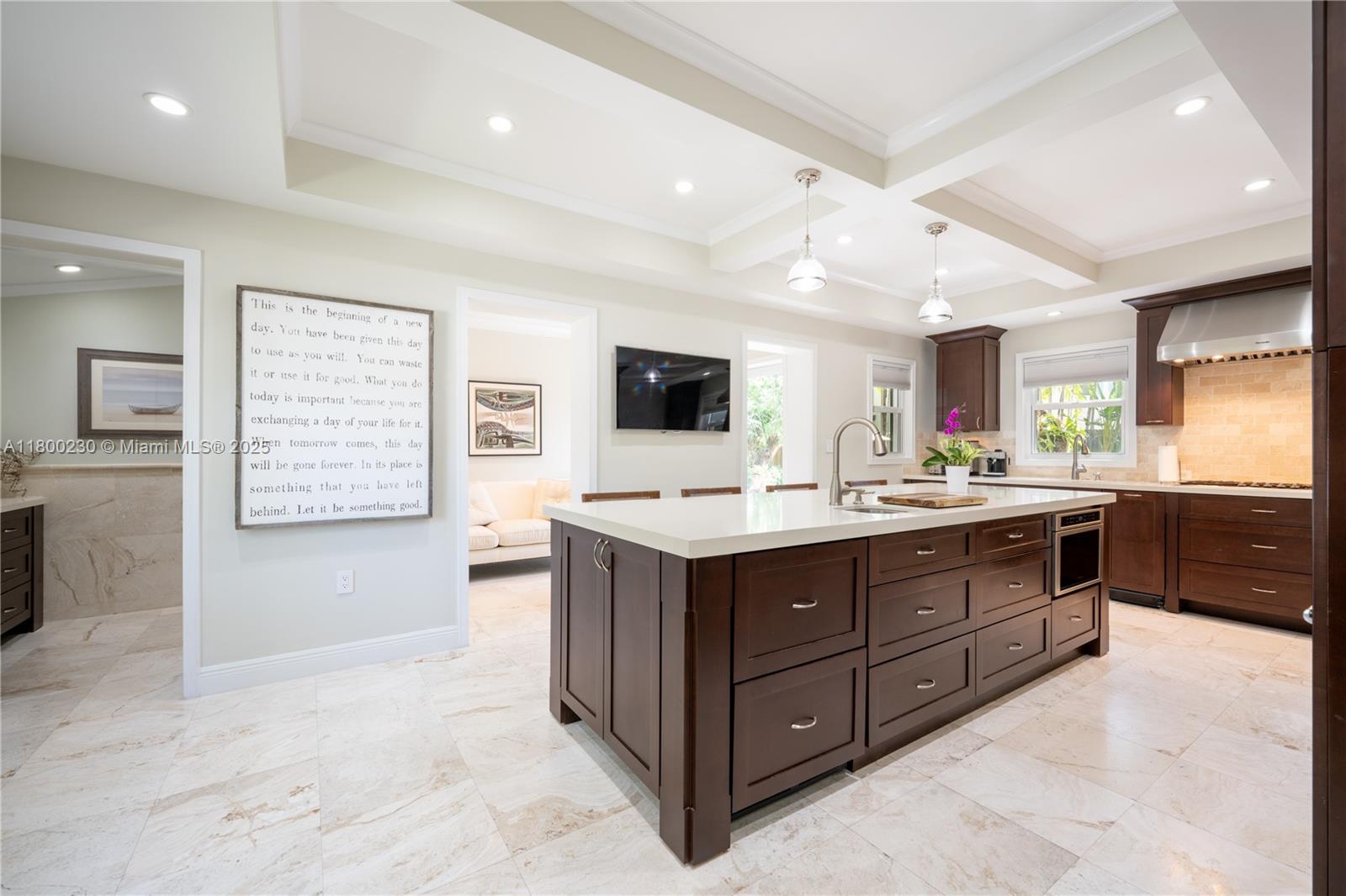 2855 Southwest 17th Avenue Miami, FL 33133 - Photo 10 of 84 The Island's Built-in Microwave and Custom Cabinetry