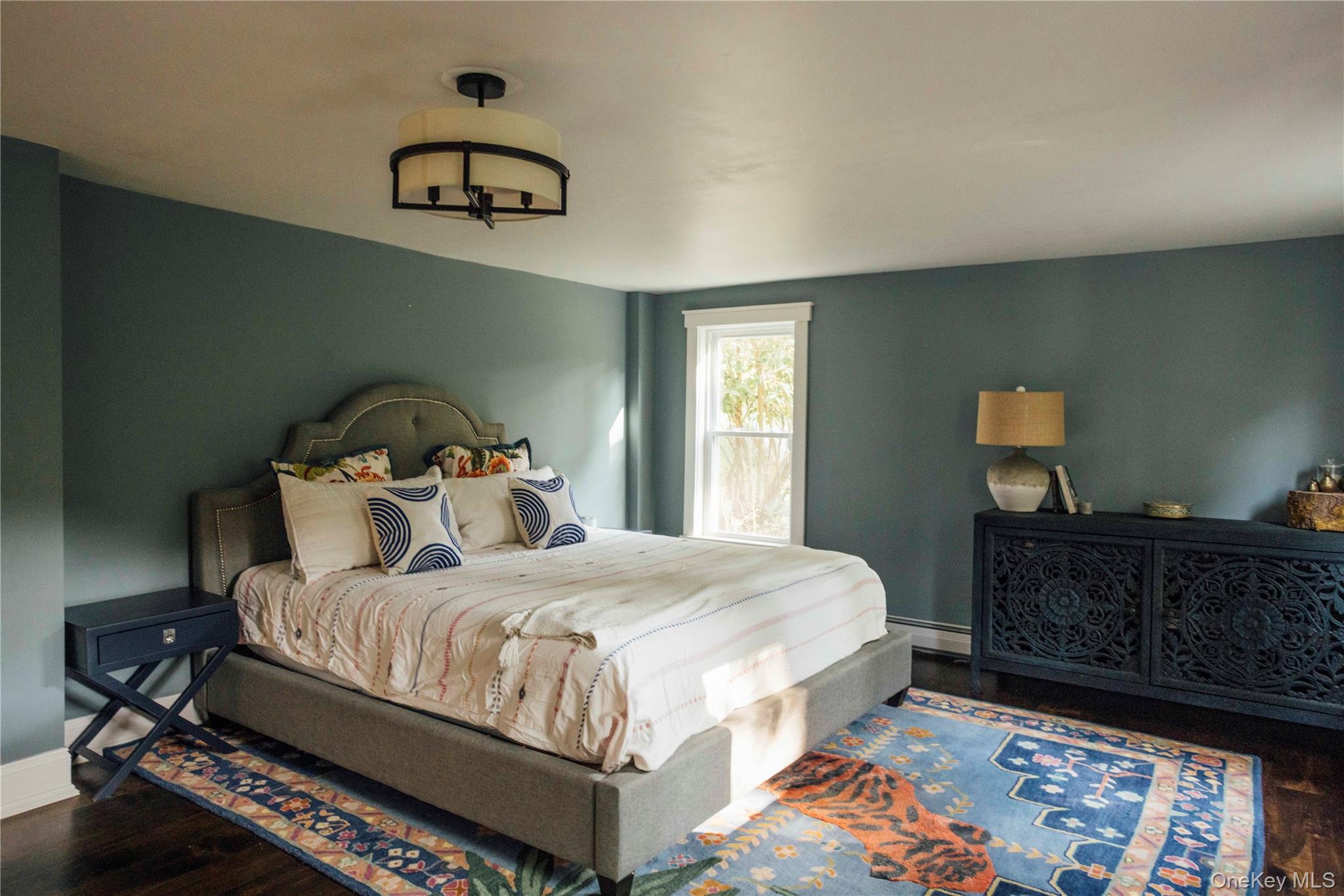 2 Locust Street Chatham, NY 12037 - Photo 20 of 29 a bedroom with a bed and a dresser