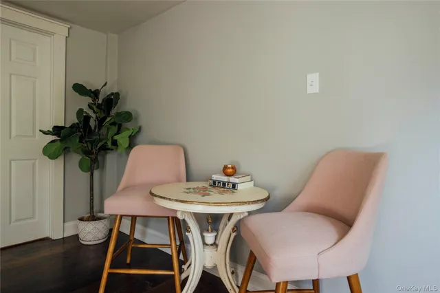 a workspace with wooden floor a chandelier fan and wooden floor