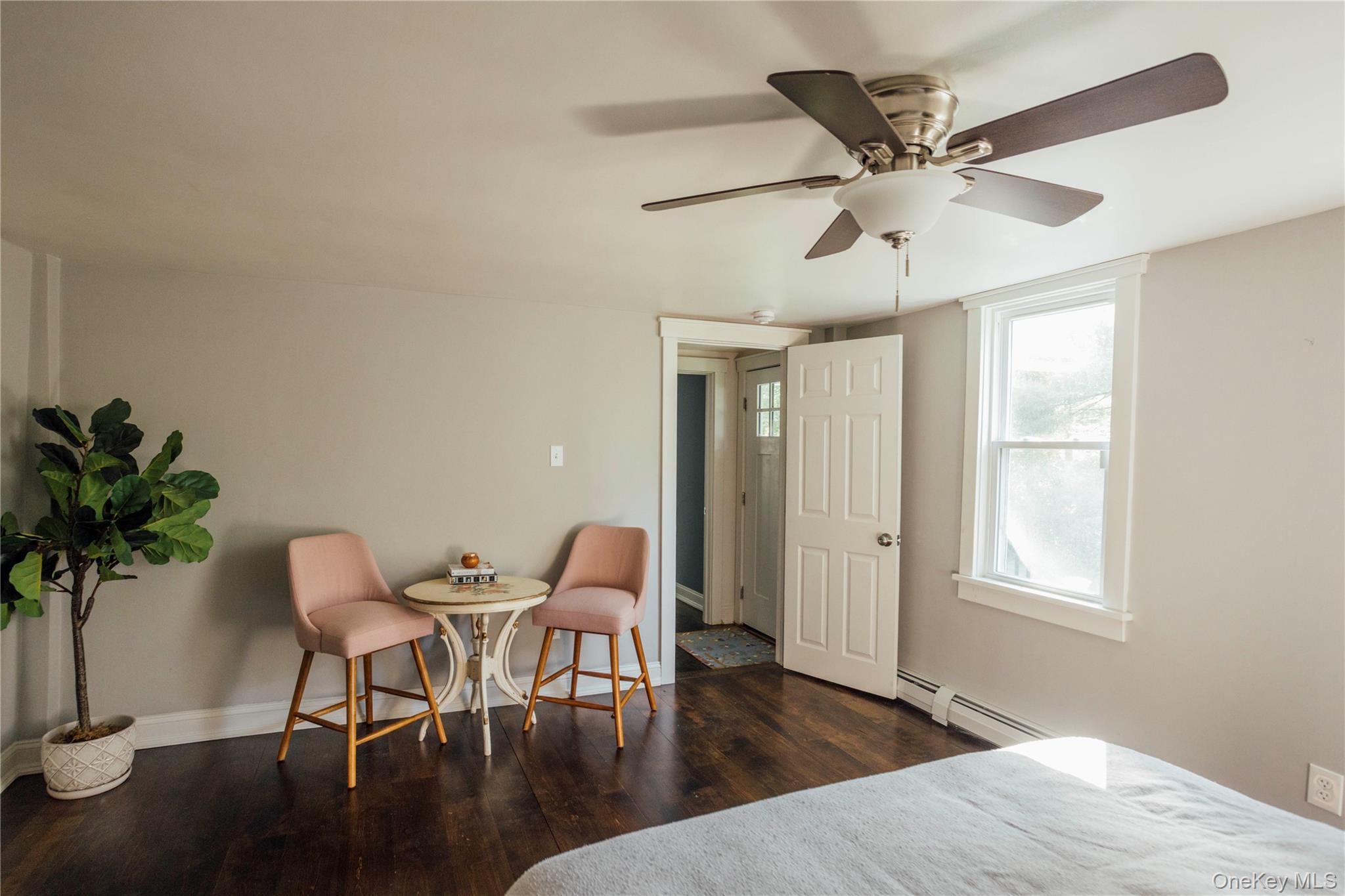 2 Locust Street Chatham, NY 12037 - Photo 23 of 29 a workspace with wooden floor a chandelier fan and wooden floor