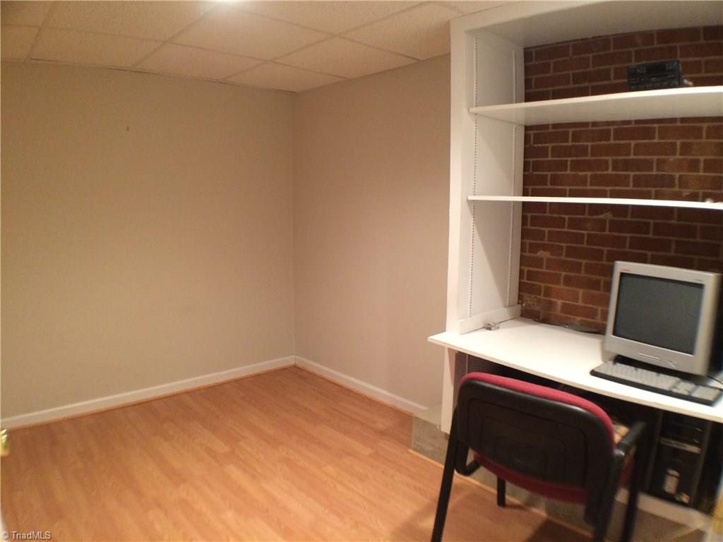 5241 Rena Road Hamptonville, NC 27020 - Photo 14 of 22 Lower Level Office with Laminate Flooring and Drop Ceiling.