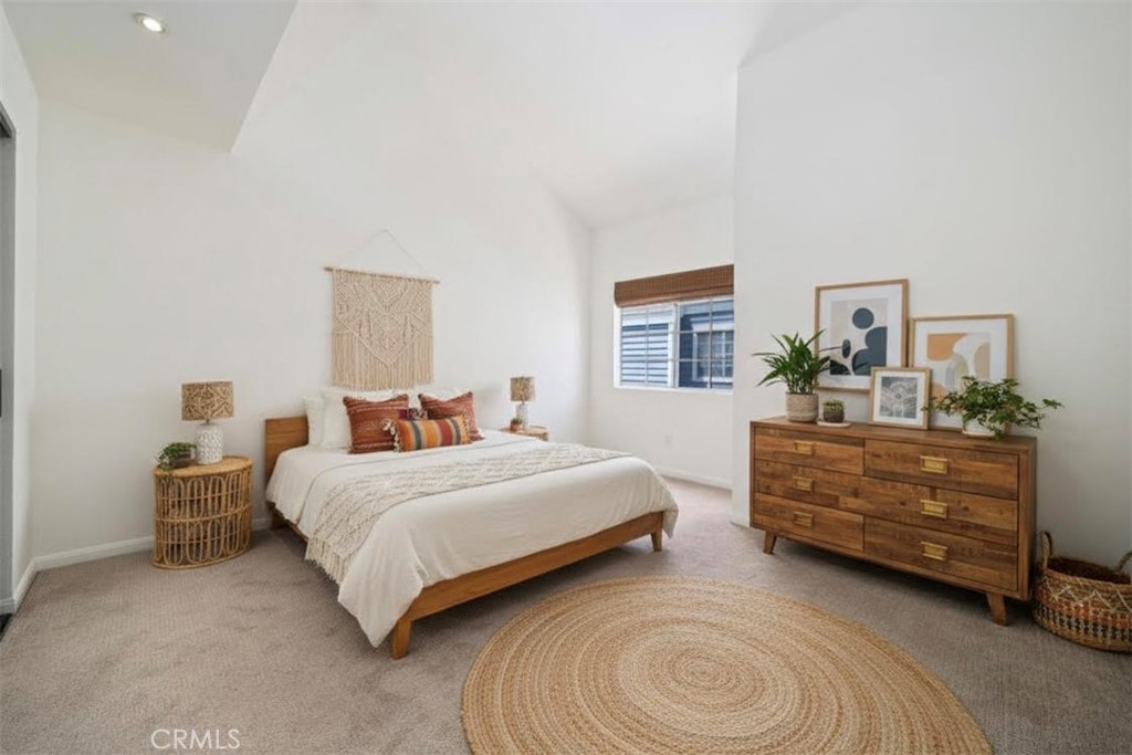 101 West Spring Street, Unit C Long Beach, CA 90806 - Photo 1 of 33 a bedroom with a bed and a dresser