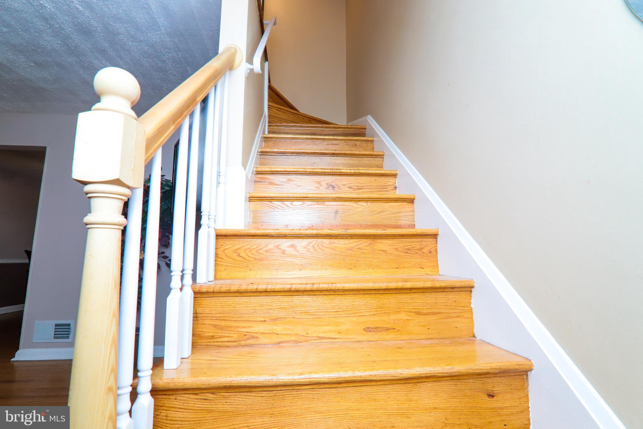 1695 Langford Road Baltimore, MD 21207 - Photo 14 of 37 steps with new banister
