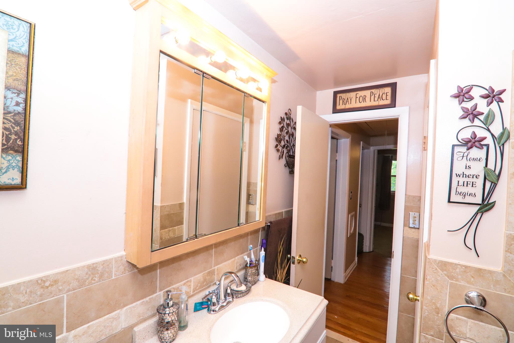 1695 Langford Road Baltimore, MD 21207 - Photo 23 of 37 Beautifully Renovated Bathroom