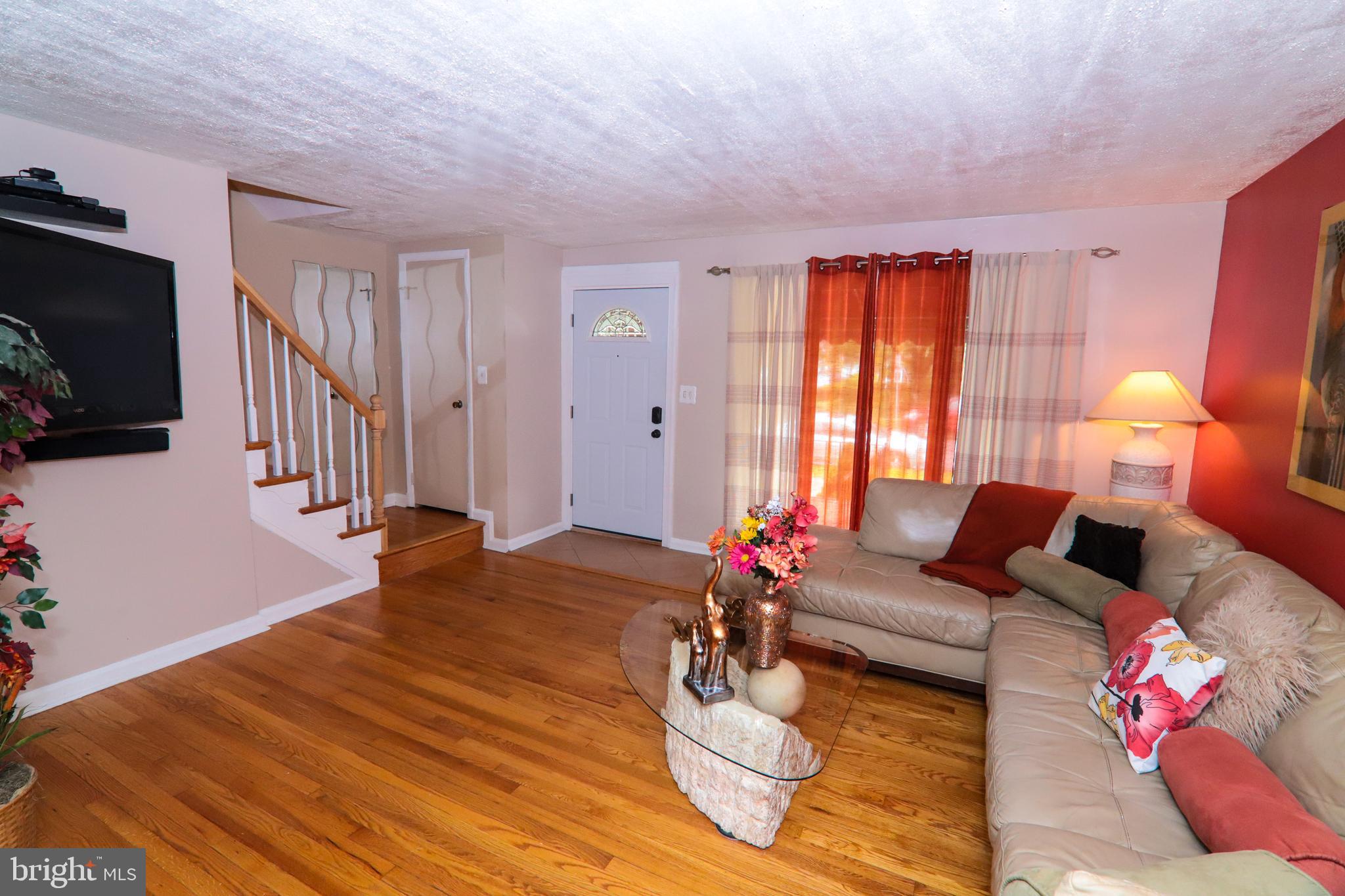 1695 Langford Road Baltimore, MD 21207 - Photo 4 of 37 Spacious Living Room with Hardwood Floors!